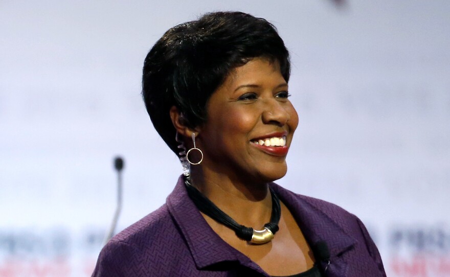 Gwen Ifill takes the stage before moderating a Democratic presidential primary debate at the University of Wisconsin, Milwaukee in February.