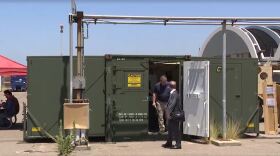 A 3D printer is contained in a metal box the size of a small shipping container is being used to produce parts for Naval operations. Aug. 5, 2025.