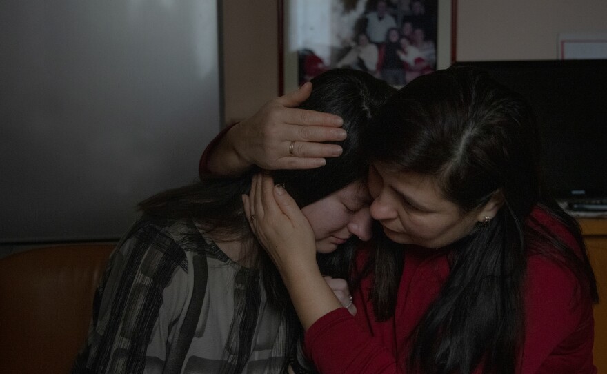 Lyubov Mala huggs her daughter Khrystyna Mala the morning she arrived in Italy from Ukraine after the beginning of the war on March 3, 2022. Lyubov was relieved because Khrystyna managed to make it to Italy, arriving by bus a few weeks after the conflict started.