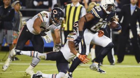 San Diego Chargers tight end Antonio Gates (85) runs as Chicago Bears cornerback Kyle Fuller (23) and outside linebacker Jonathan Anderson (58) defend during the second half of an NFL football game in San Diego, Nov. 9, 2015.