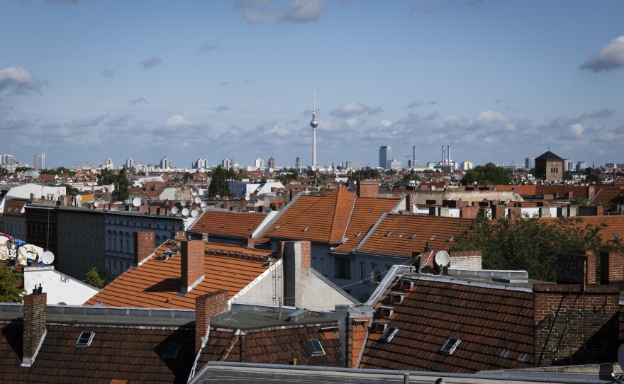 View of Berlin from the Neukölln district, home to some of Germany's 800,000 Syrian refugees. In 2018, French and German prosecutors issued the first international arrest warrants for senior Syrian security officials. Yet, President Bashar Assad and his lieutenants remain in Syria, out of reach of prosecutors.