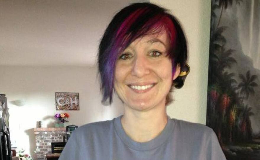 Mary Dague wearing one of her funny T-shirts. The former Army bomb technician lost both her arms in Iraq.