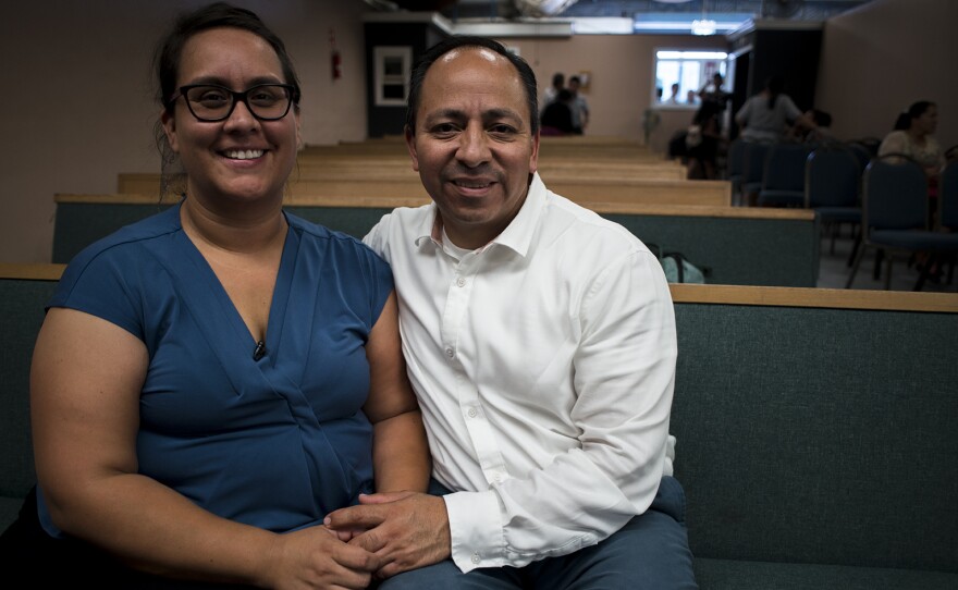 Bridget and Eduardo Bohorquez pose for a portrait within the Apostolic Assembly of the Faith in Christ Jesus church in Tijuana on Sept. 9, 2017, where Eduardo works as a pastor.