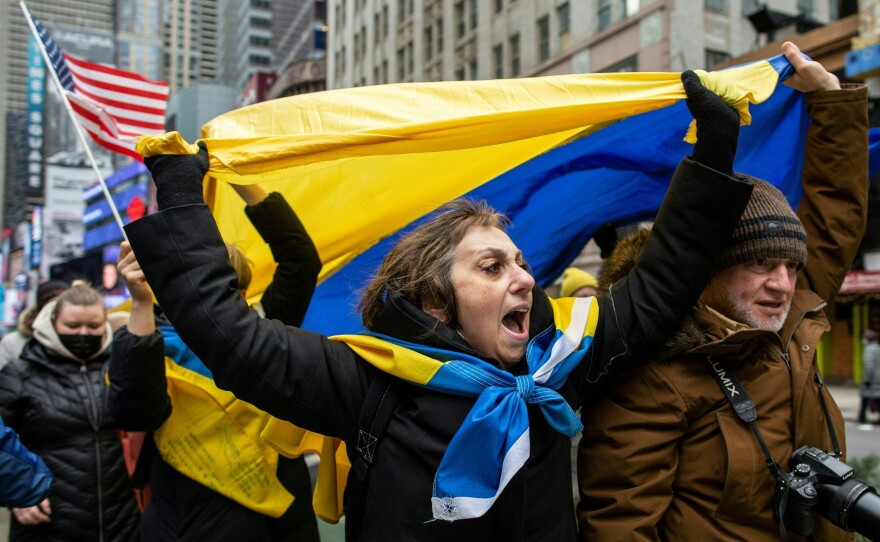 Demonstrators rally in New York City's Times Square in support of Ukraine on Thursday.