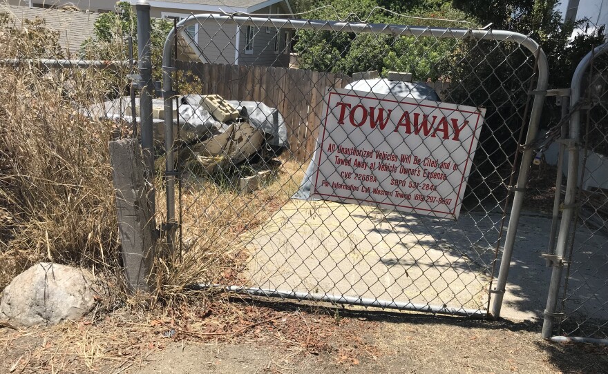 A neighbor's tow-away sign warns away Border Patrol vehicles, July 4, 2018.