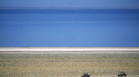 Off-road vehicles are driven on the property owned by Controlled Thermal Resources, which will be mined for lithium along the Salton Sea, in Niland, Calif., Thursday, July 15, 2021. Demand for electric vehicles has shifted investments into high gear to extract lithium from geothermal wastewater around California's dying Salton Sea. The ultralight metal is critical to rechargeable batteries.