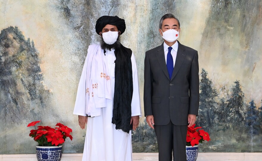 Chinese Foreign Minister Wang Yi meets with Mullah Abdul Ghani Baradar, political chief of Afghanistan's Taliban, in Tianjin, China, on July 28.