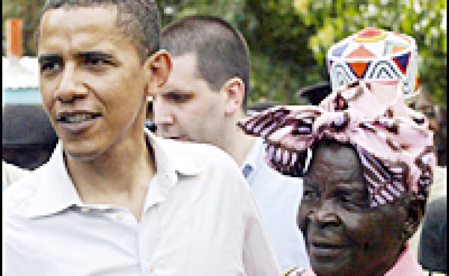 U.S. Sen. Barrack Obama greets his grandmother Sarah Obama at their rural home in Siaya, Kisumu, Kenya, Aug. 26, 2006, during his first visit in 14 years. Thousands of singing and dancing villagers thronged the dusty streets of rural, western Kenya to greet the senator he visited his father's birthplace.