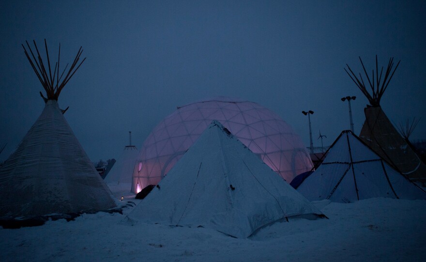 A geodesic dome, which was donated in October, now serves as a community gathering space. It is one of many structures that have been erected in the camp to prepare for the long winter ahead.