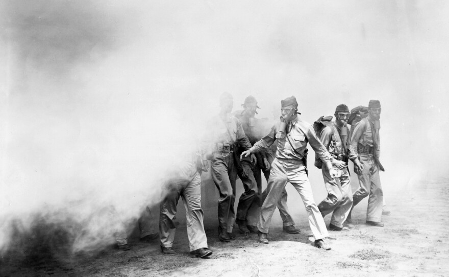 U.S. troops in Panama participate in a chemical warfare training exercise with smoke during World War II.