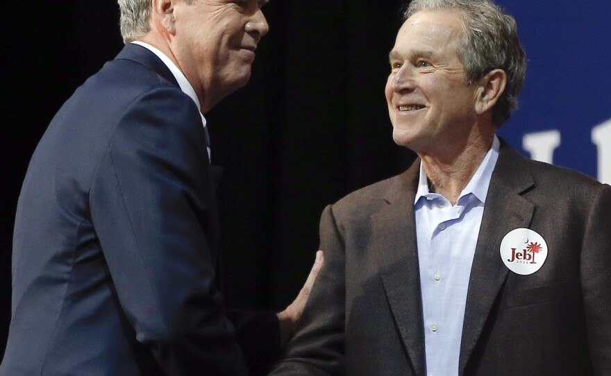 Former President George W. Bush appears at a rally during the final week of his brother Jeb Bush's 2016 presidential campaign, in North Charleston, S.C.