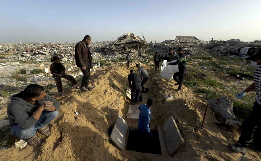 Survivors dig new graves and gently lower into them bags of bones — bags that weigh almost nothing but mean everything to them.