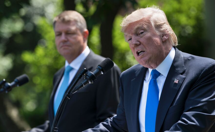 President Trump and Romania's President Klaus Iohannis at a press conference in the Rose Garden of the White House on Friday.