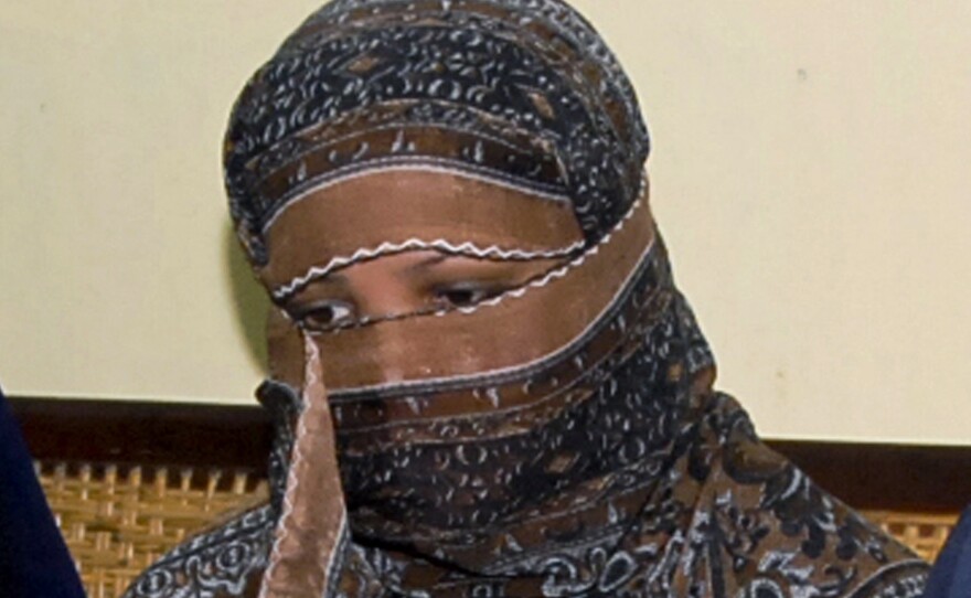 Asia Bibi, pictured in 2010, traveled safely from Pakistan to Canada on Tuesday, according to her lawyer. She is reunited with her two daughters who have also been granted asylum there.