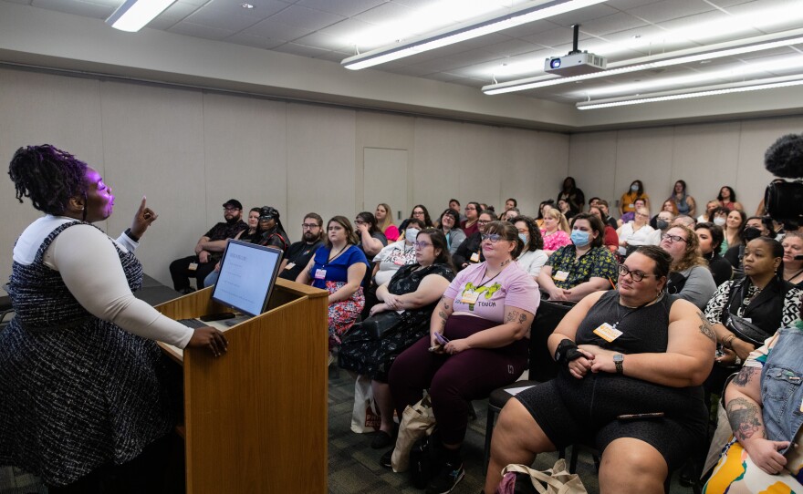 Attendees listen to a presentation by Joy Cox, the author of <em>Fat Girls in Black Bodies: Creating Communities of Our Own</em>.