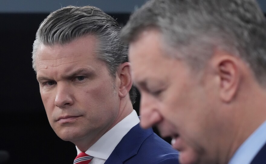 Defense Secretary Pete Hegseth and Chairman of the Joint Chiefs of Staff Gen. Dan Caine speak to members of the media during a press briefing at the Pentagon in Washington, Tuesday.