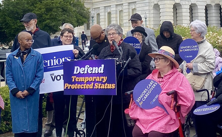 At 82, Rita Siebenaler, center, has been speaking out about the need for immigrant workers, including caregivers with Temporary Protected Status.