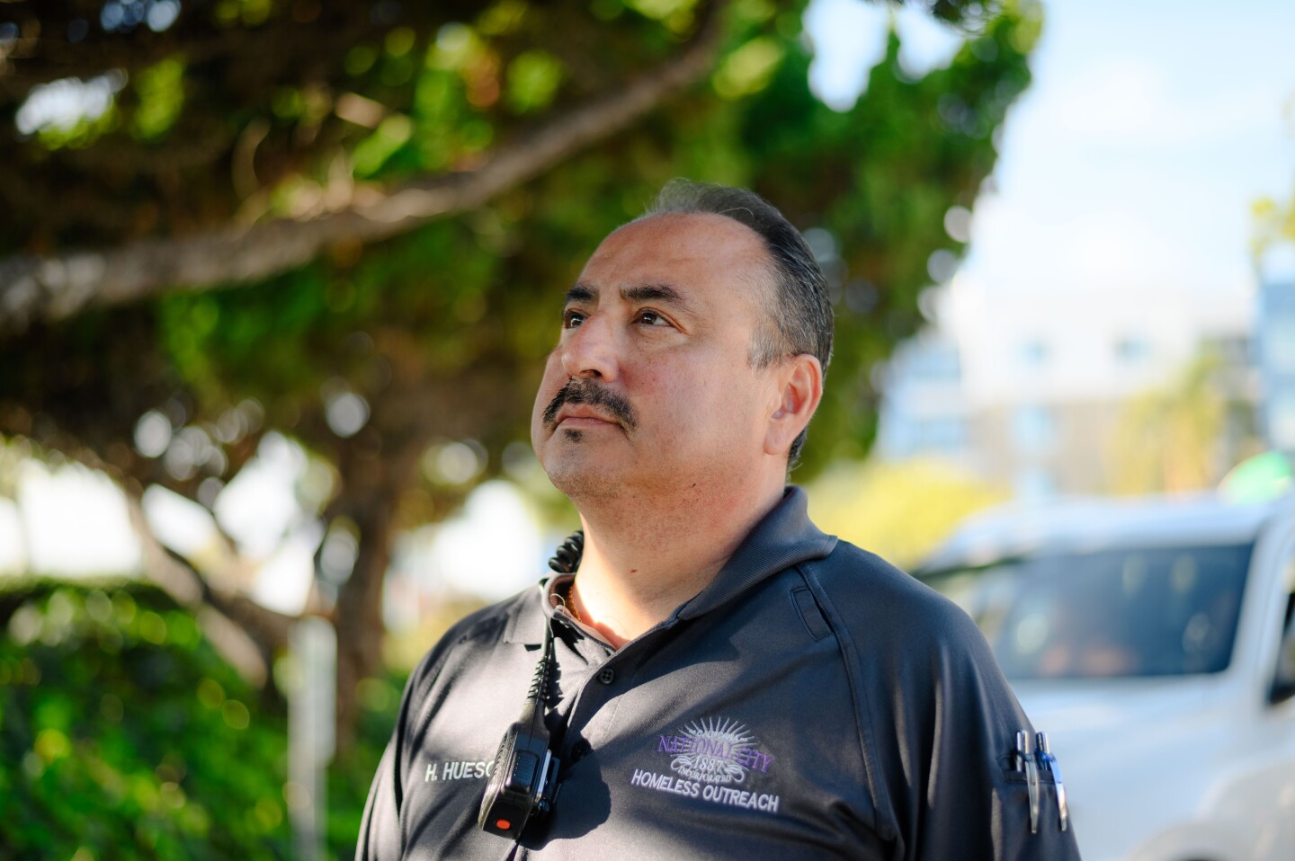 National City HOME team caseworker and code conformance officer Hector Hueso stands for a portrait outside City Hall on March 7, 2024.