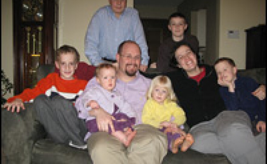 Misty and Seth Huckstead (seated) of Grand Rapids, Mich., have six children and another one on the way; they plan to have as many children as possible. "Family has always been the foundation of church and society," Misty says. "It's God's design; it's beautiful."
