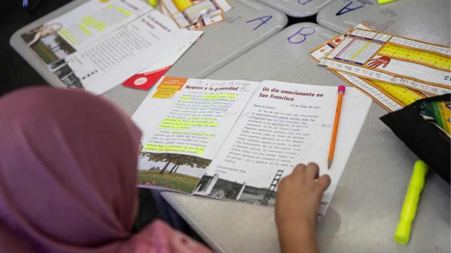 A native Farsi speaker works on a Spanish language assignment at Washington Elementary School in Madera on Oct. 29, 2024. 
