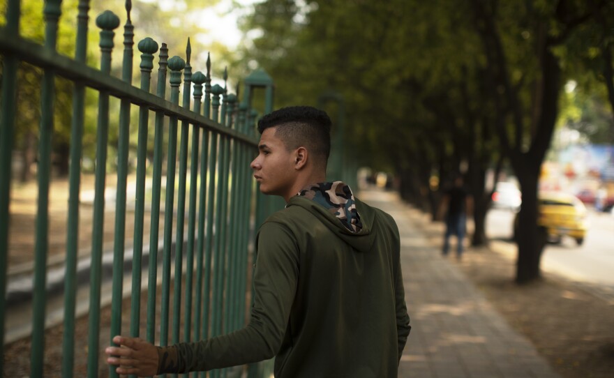 Rojas Tapias, 19, defected from the Venezuelan military and is now living in Colombia. Fellow defector, Williams Cancino, says more than 200 other former Venezuelan forces are cooped up in a hotel in Villa del Rosario.