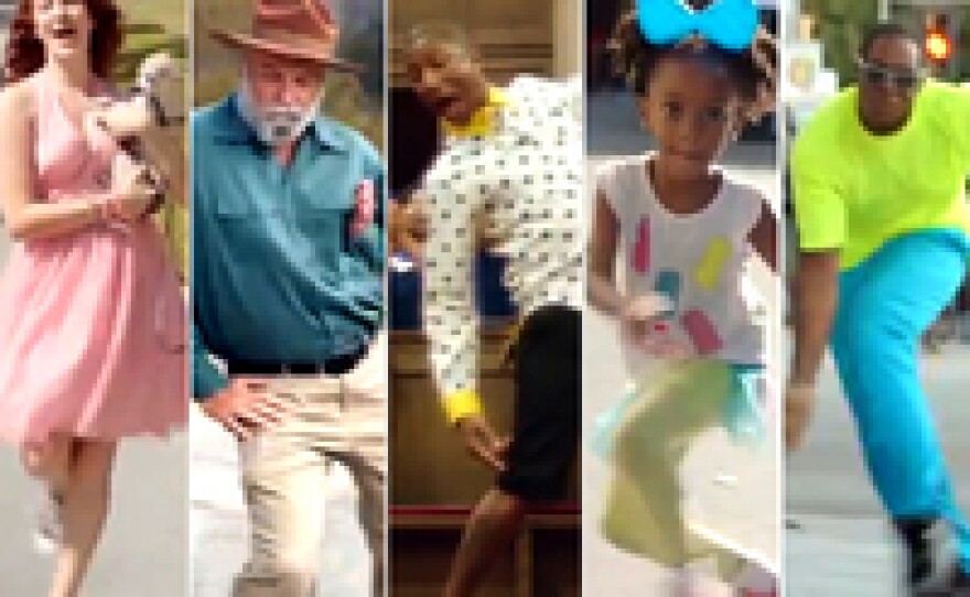 A variety of dancers from Pharrell Williams' video for the song "Happy."