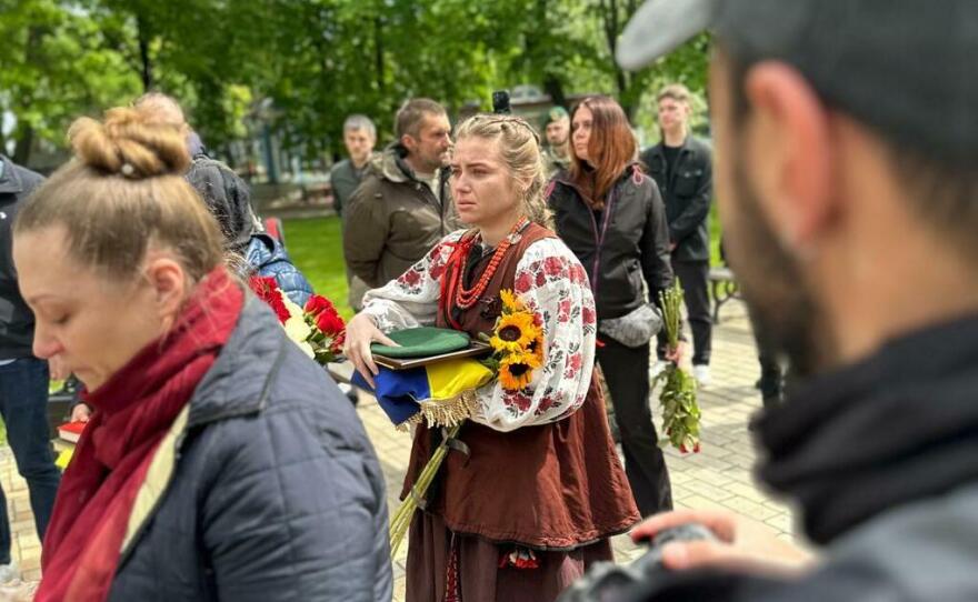 Iva Sanina, Christopher Campbell's fiancee, seen after receiving the flag that draped his coffin.