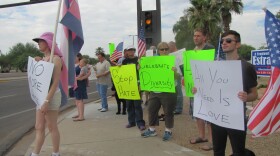 On July 14 about 50 people rallied in Gilbert, Ariz. in support of a same-sex couple who have been harassed in their home. Whether or not the harassment should be considered a hate crime has been a topic of discussion in the community.