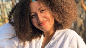 Melonie Vaughn dons a white lab coat at UC San Diego in this photo taken in August, 2019. 
