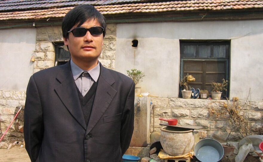 This undated handout image provided by ChinaAid shows blind Chinese legal activist Chen Guangcheng, whose escape from house arrest is at the heart of a growing U.S.-China firestorm.