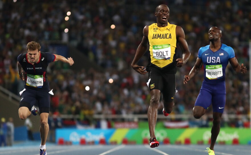 Sprinter Usain Bolt of Jamaica celebrates after crossing the finish line to win the mens 200m final at the Rio 2016 Olympic Games at the Olympic Stadium Thursday night.