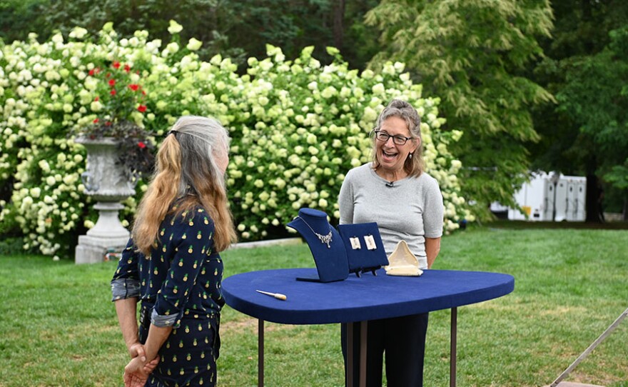 Appraiser Sarah Churgin (left) appraises a Howard & Co. diamond necklace at Wadsworth Mansion