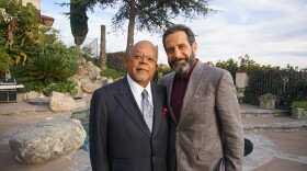 Actor Tony Shalhoub (right) and host Henry Louis Gates, Jr. while taping FINDING YOUR ROOTS.
