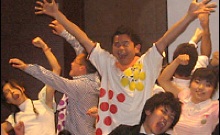 Japanese and Chinese students in the all-singing, all-dancing finale of the play they wrote themselves, <em>Zouba!</em> Professor Liu Haiping, who guided the project, says it's a "miracle" that the play actually was staged.