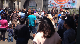 Dozens of people, including a group of 18 students from Maac Community Charter School in Chula Vista, came to Border Angels headquarters near downtown San Diego to show their support for the migrant families from Central America, July 2, 2014.