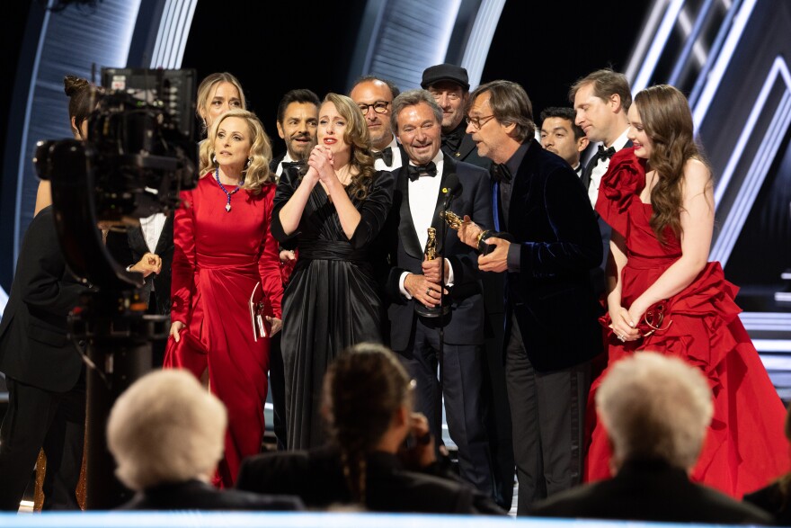 Patrick Wachsberger, Philippe Rousselet and the cast of “CODA” accept the Oscar® for Best Picture at the 94th Oscars®. March 27, 2022.