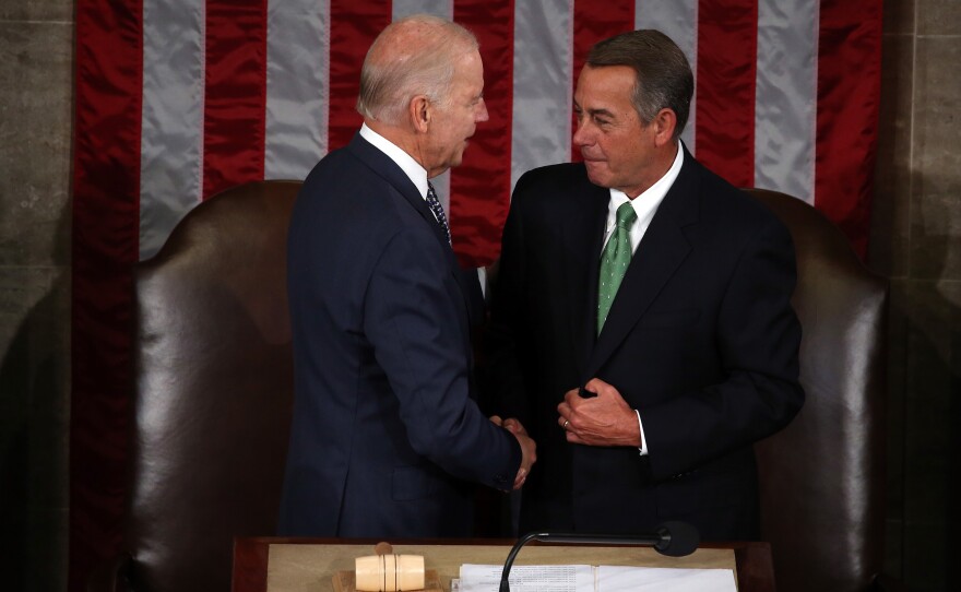 Vice President Joe Biden (left) and Speaker of the House John Boehner shake hands prior to Pope Francis speech to Congress on Thursday.