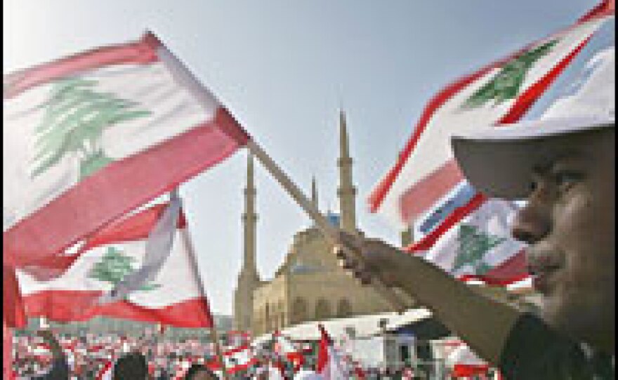 Mourners gather in Beirut to attend the funeral of assassinated Lebanese politician Pierre Gemayel on Nov. 23, 3006.
