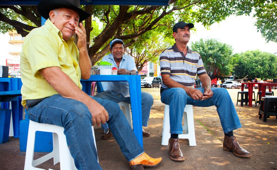 In Cassol's hometown of Rolim de Moura, Antônio Miranda, 73, (right) and Amadeu dos Santos, 73, (left) say they know Cassol personally and believe he's changed their state for the better. If he ever runs again, they say he would win in a heartbeat.