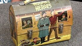 In Phoenix, Arizona, Rudy Franchi appraises a 1966 "Hogan's Heroes" lunchbox.