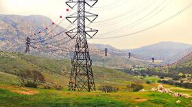 In this illustration by saveelmontevalley.com, towers are digitally added to simulate the route of the Sunrise Powerlink near El Cajon Mountain.
