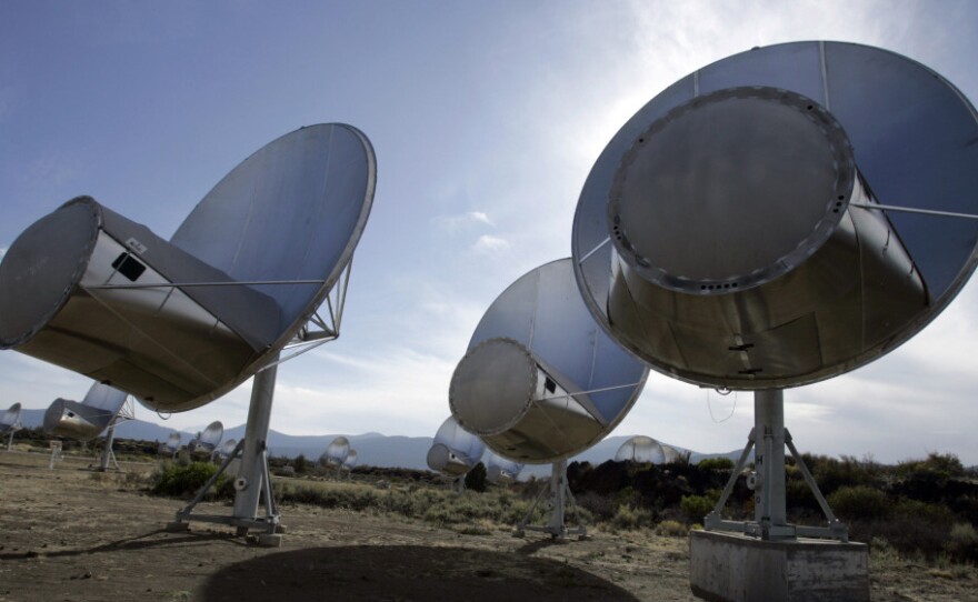 Radio telescopes of the Allen Telescope Array are seen in Hat Creek, Calif. A signal that intrigued scientists has been found to have its roots on Earth, Russian scientists say.