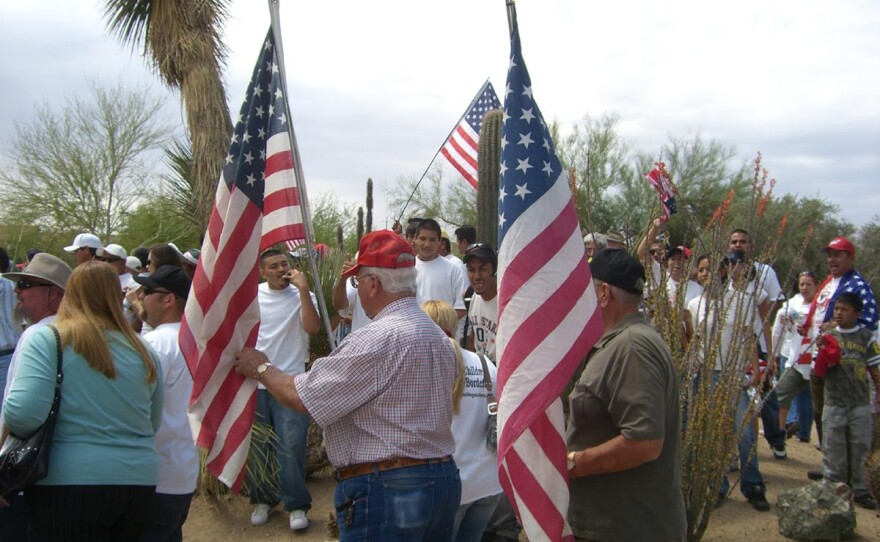 Immigrant rights activists and anti-illegal immigration activists square off at a May Day rally in Phoenix in 2007.
