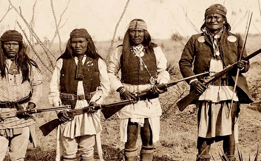 Archival, four Apache with rifles (undated photo)