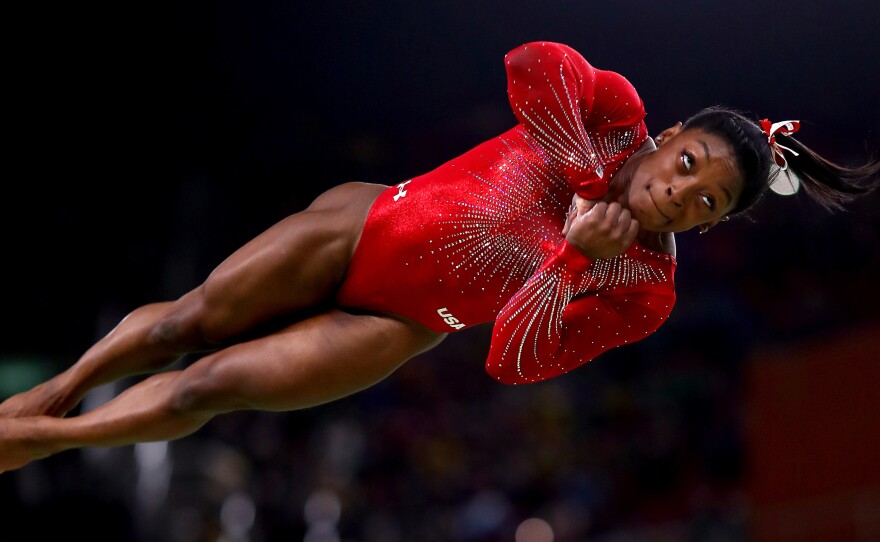 Simone Biles won the women's vault final in the Rio Olympic Arena, setting a new mark for wins in a single Olympics by an American woman.