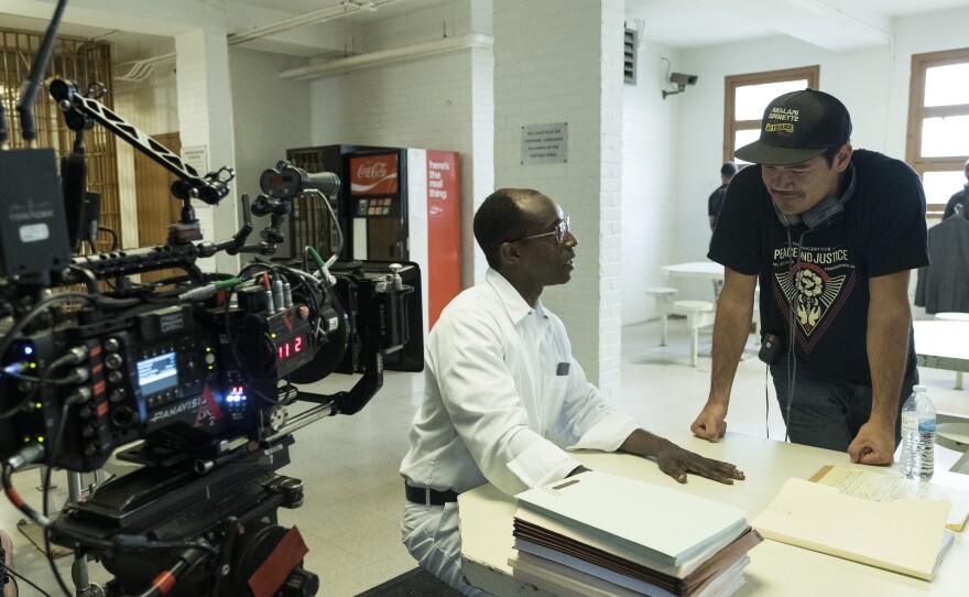 Filmmaker Destin Daniel Cretton on the set of "Just Mercy" with actor Rob Morgan.
