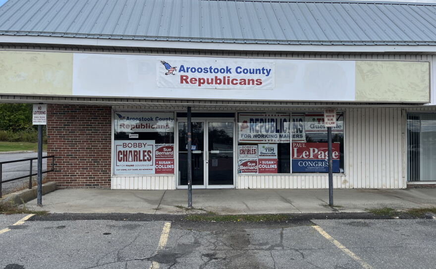 Campaign signs fill the windows of the Aroostook County Republican campaign headquarters in Caribou, Maine.
