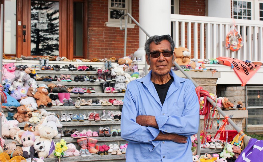 Geronimo Henry, 84, is a regular fixture at the site, helping tidy up the tributes and speaking with visitors. "If you guys got any questions about the school, I went to this school from '42 to '53 — 11 years," he tells a couple on a recent afternoon.