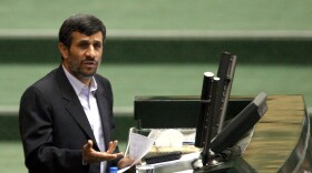 Iranian President Mahmoud Ahmadinejad addresses a parliamentary session in Tehran on Jan. 24.