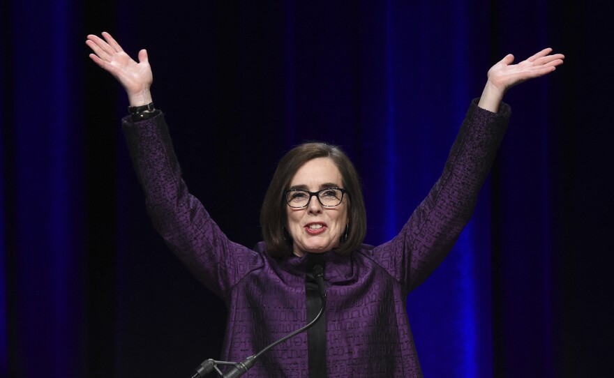 Oregon Gov. Kate Brown speaks to the crowd of supporters after being elected at the convention center in Portland, Ore., on Tuesday.